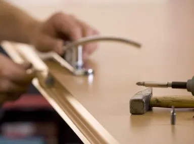 Professional locksmith at work